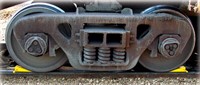 Two polyurethane wheel chocks securing a train on railway tracks – Safetrack safety equipment